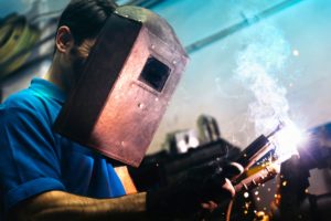 professional mechanic welding